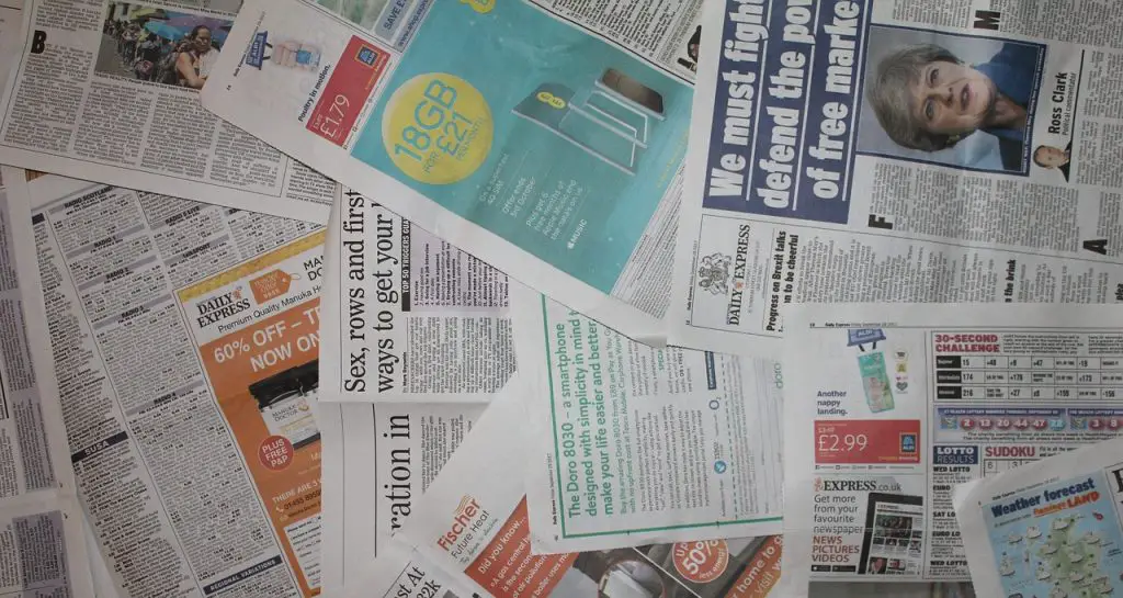 tabloids on table