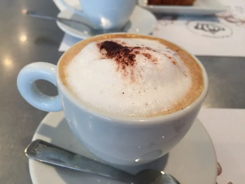 Cup of cappuccino with egg foam