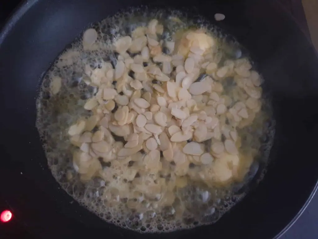 Frying the almonds in butter