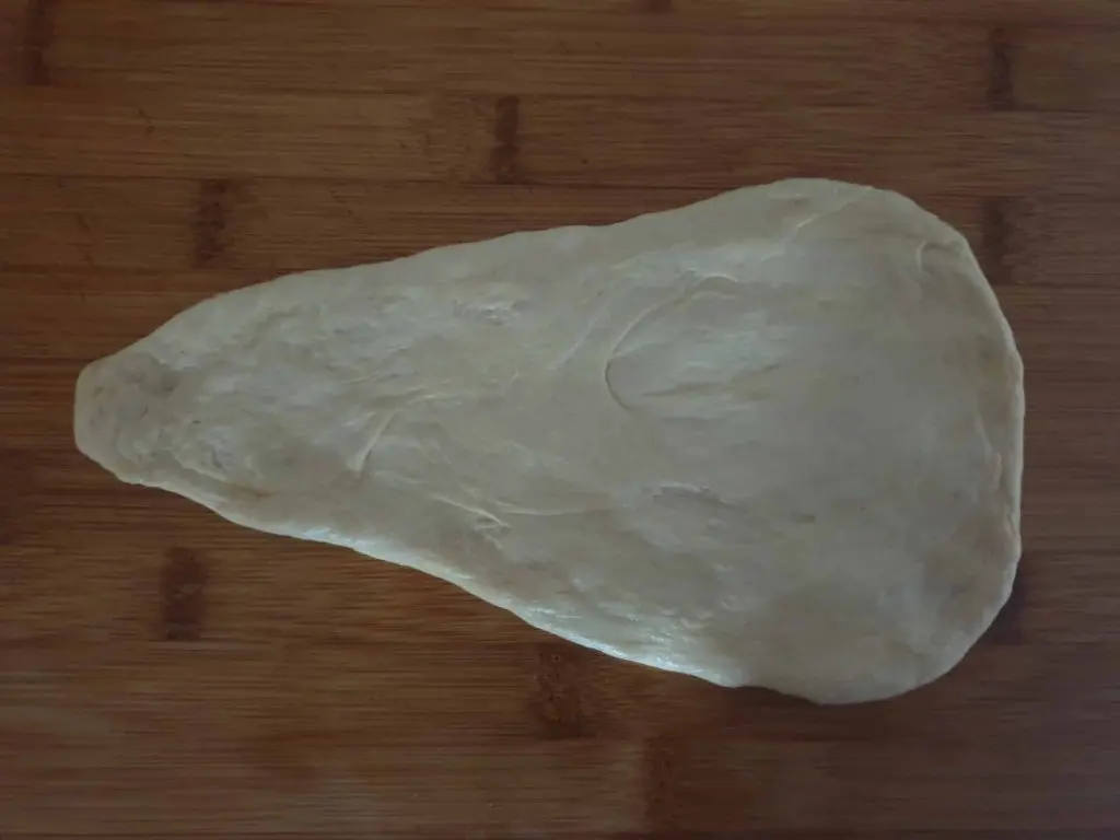 Spreading the dough out thinly
