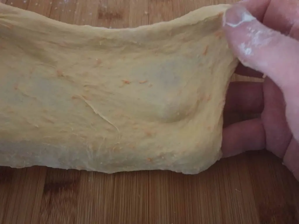 Windowpane test for carrot bread rolls