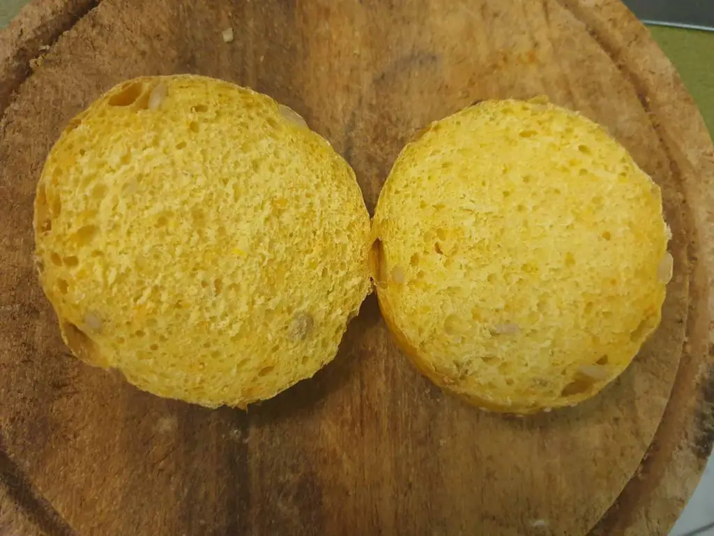 Crumb of carrot bread rolls