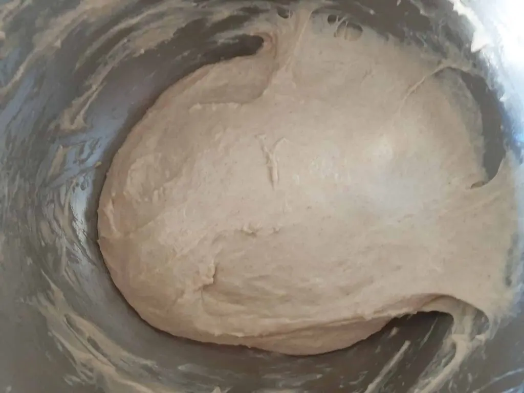 Kneaded dough sticking to the bowl