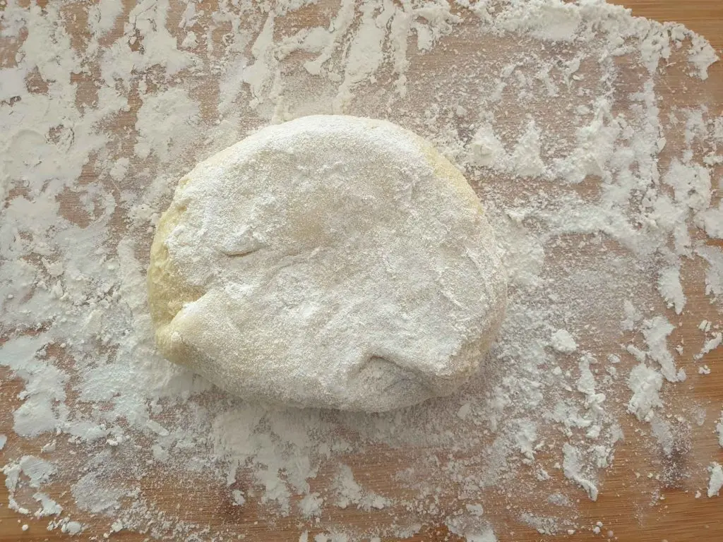 Generously floured potato dough