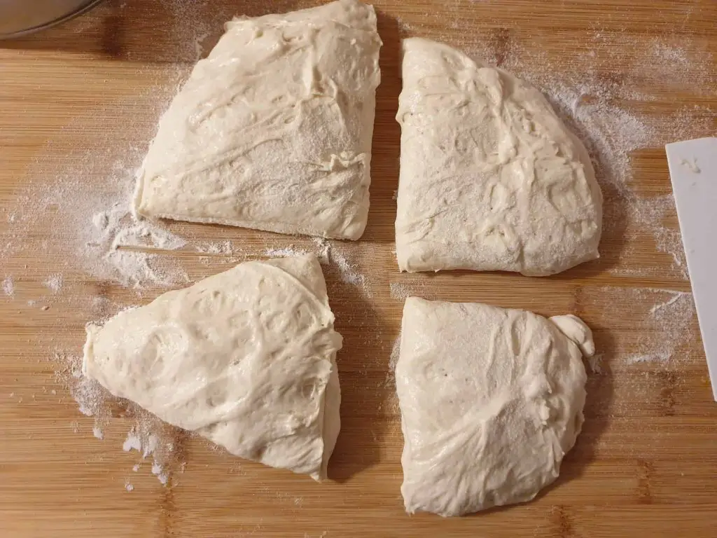 Dividing the dough in 4 pieces