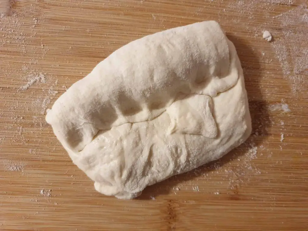 Rolling dough into cylinder