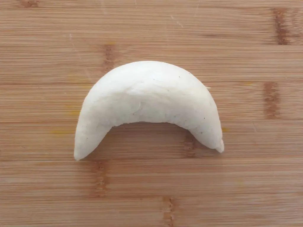 Half-moon shaped bun
