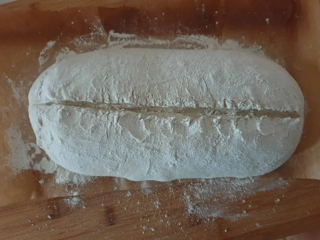 Scoring the loaf before baking