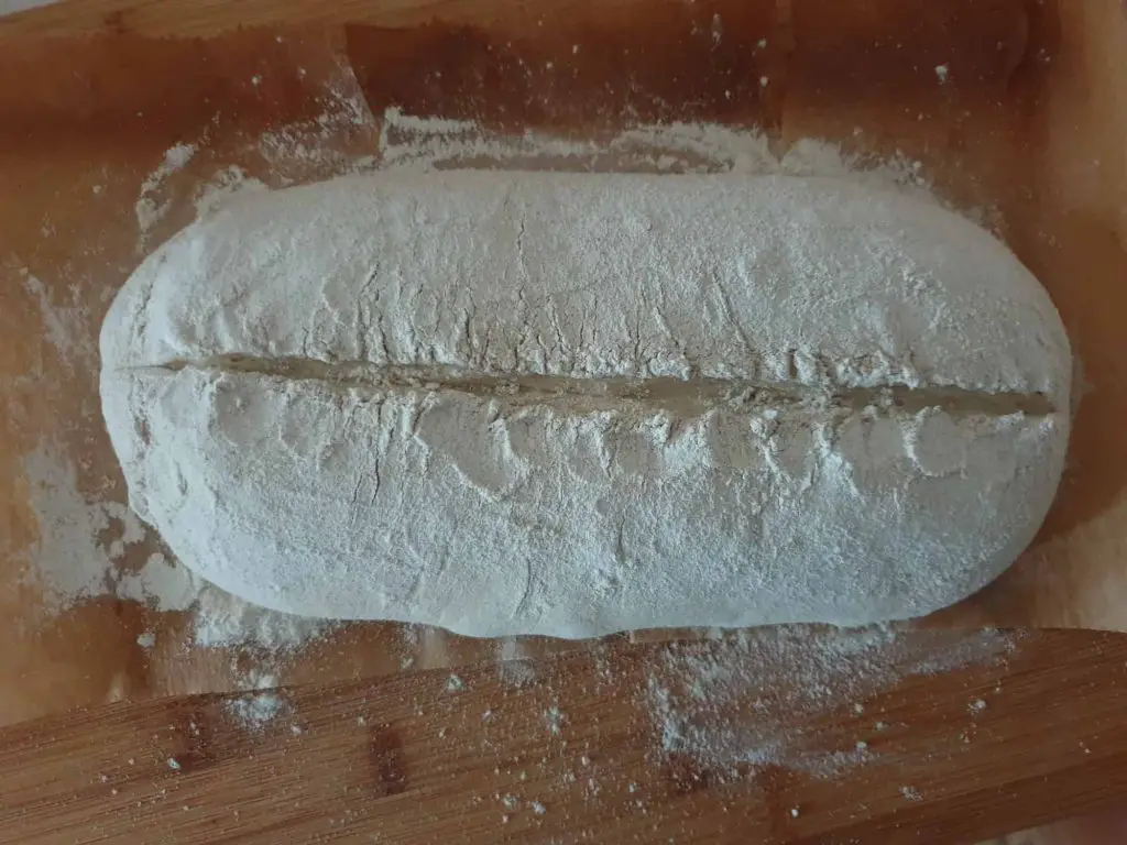 Scoring the loaf before baking